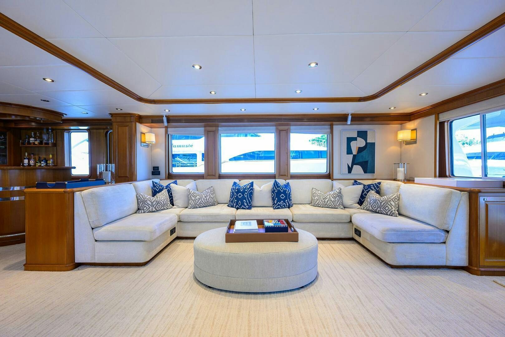 a living room with a large window aboard SOLACE Yacht for Sale