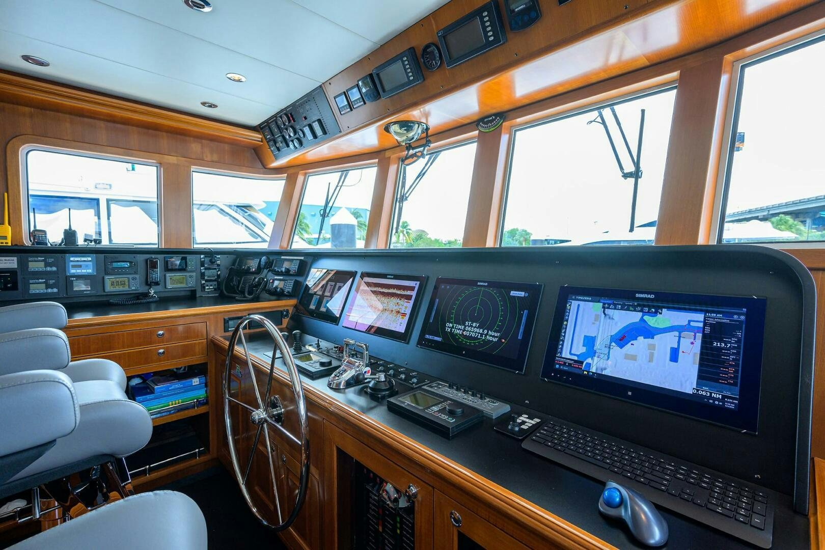 a room with computers and monitors aboard SOLACE Yacht for Sale