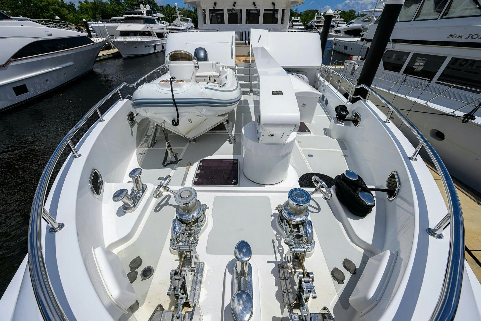 a boat with a motor attached to it aboard SOLACE Yacht for Sale