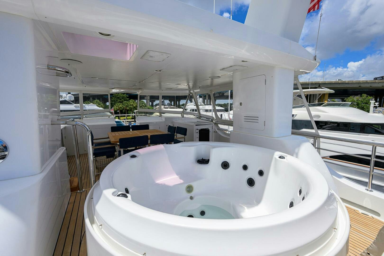 a white bathtub in a room aboard SOLACE Yacht for Sale