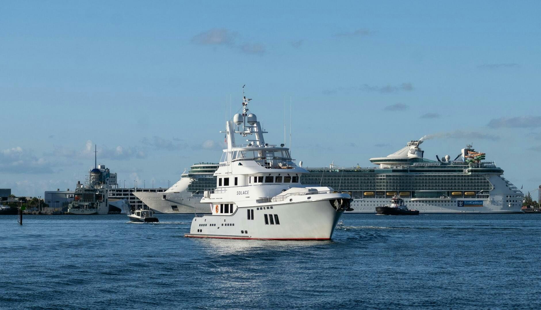 a white boat in the water aboard SOLACE Yacht for Sale
