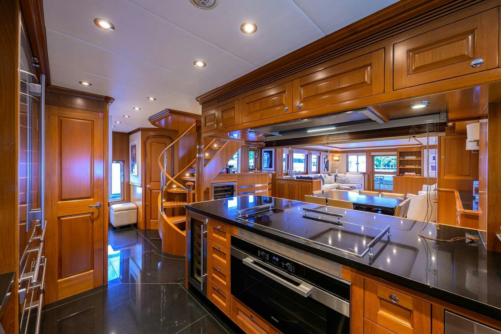 a kitchen with a large island aboard SOLACE Yacht for Sale