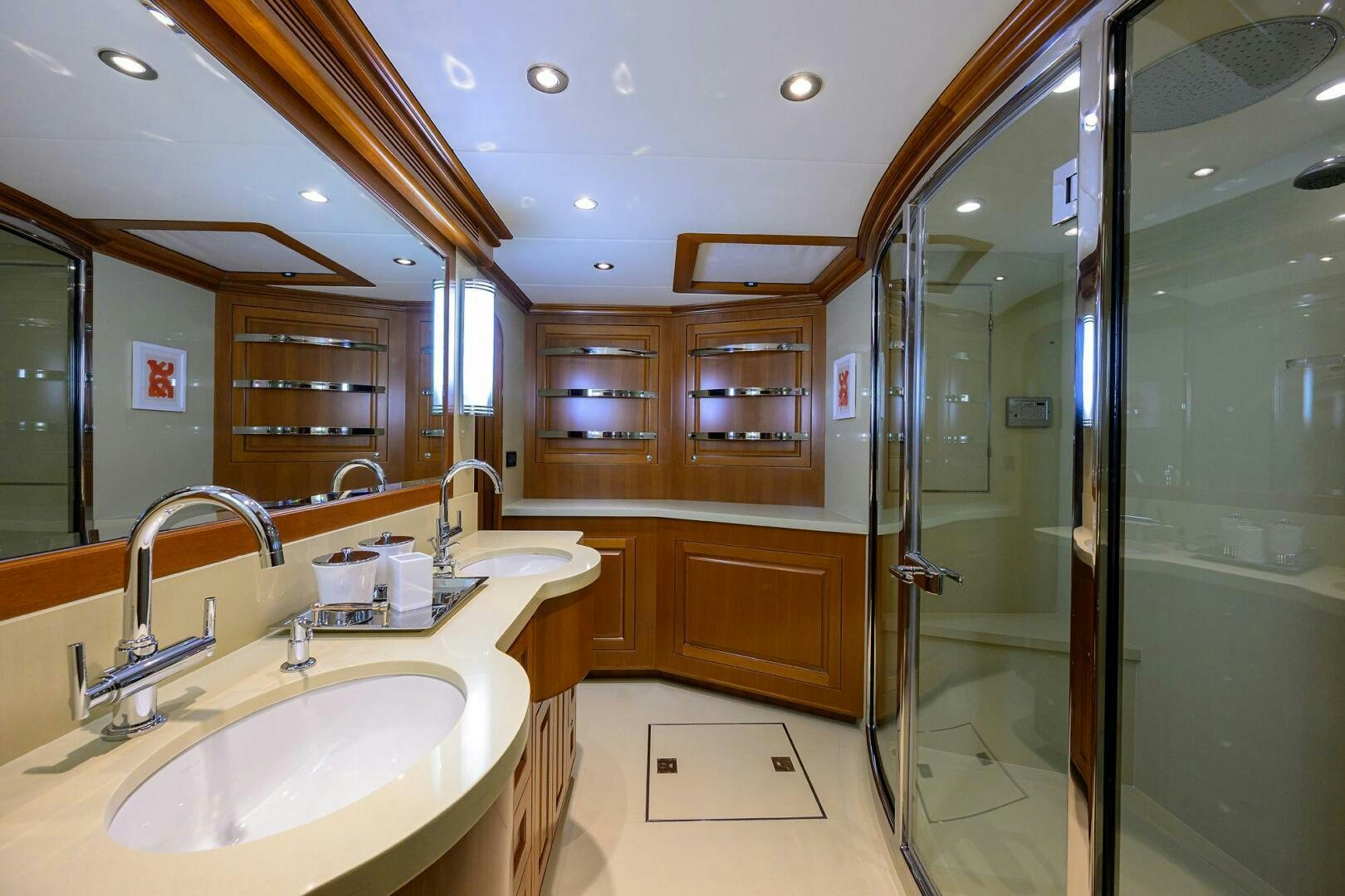 a bathroom with a sink and mirrors aboard SOLACE Yacht for Sale