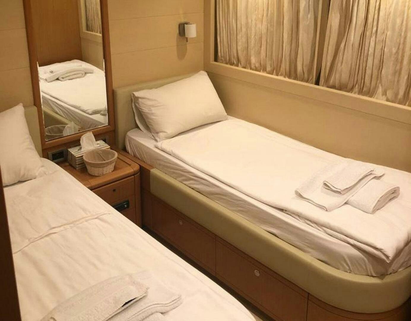 a hotel room with two beds aboard MAR AZUL Yacht for Sale