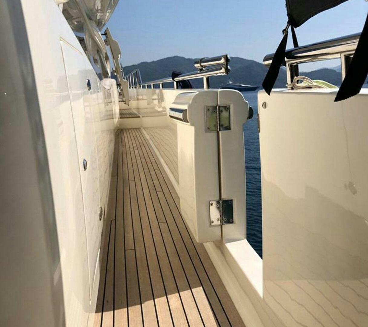 a large white machine on a wooden deck aboard MAR AZUL Yacht for Sale