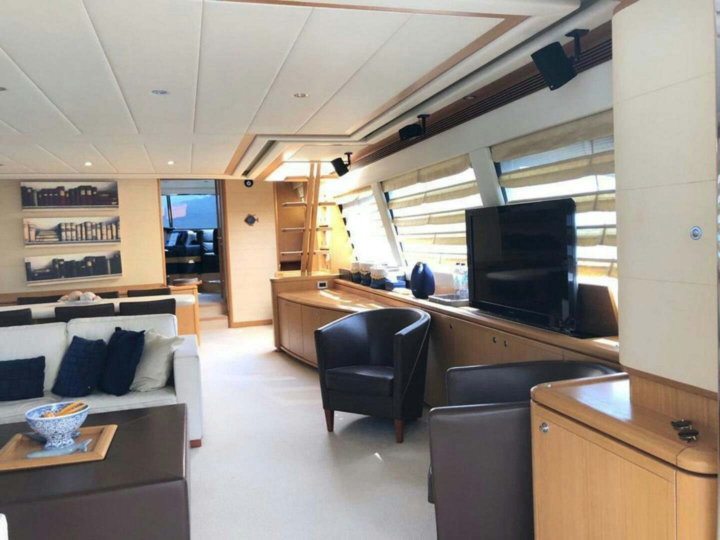 a room with a desk and a tv aboard MAR AZUL Yacht for Sale
