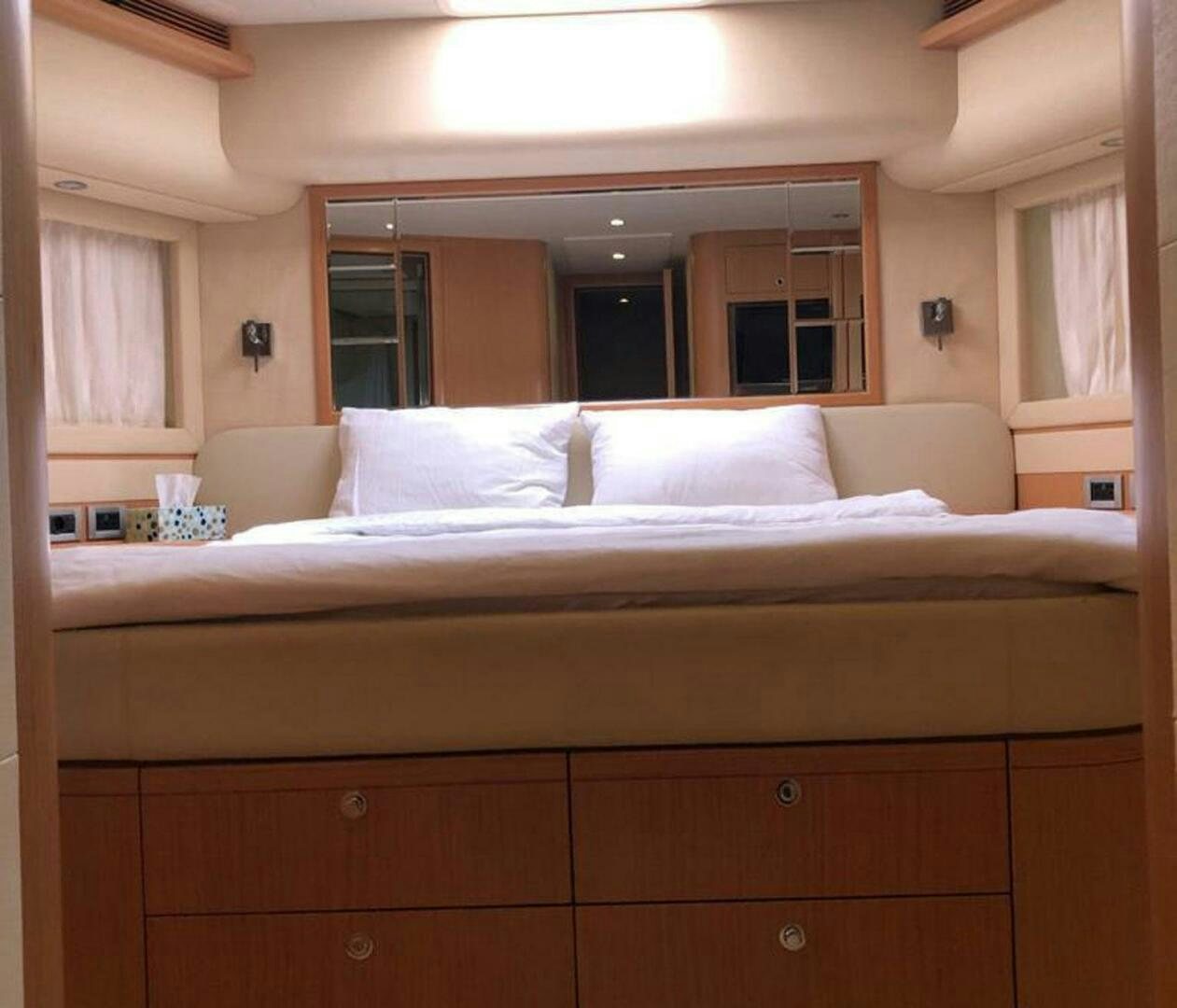 a bed with white sheets aboard MAR AZUL Yacht for Sale