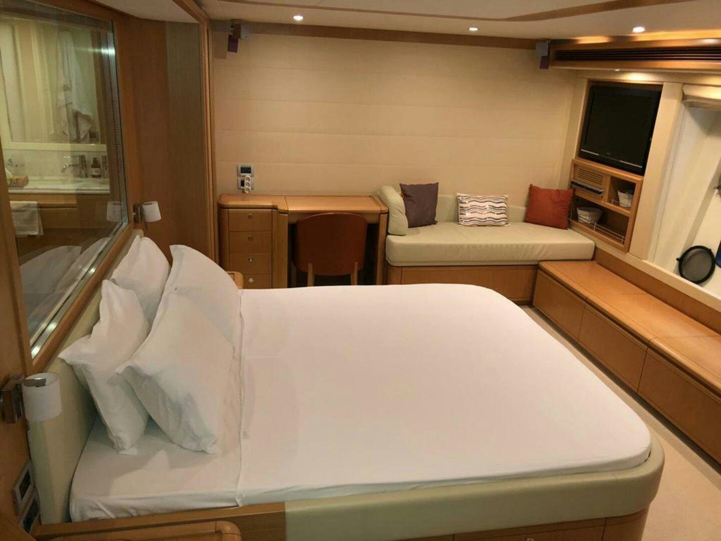 a bed in a room aboard MAR AZUL Yacht for Sale