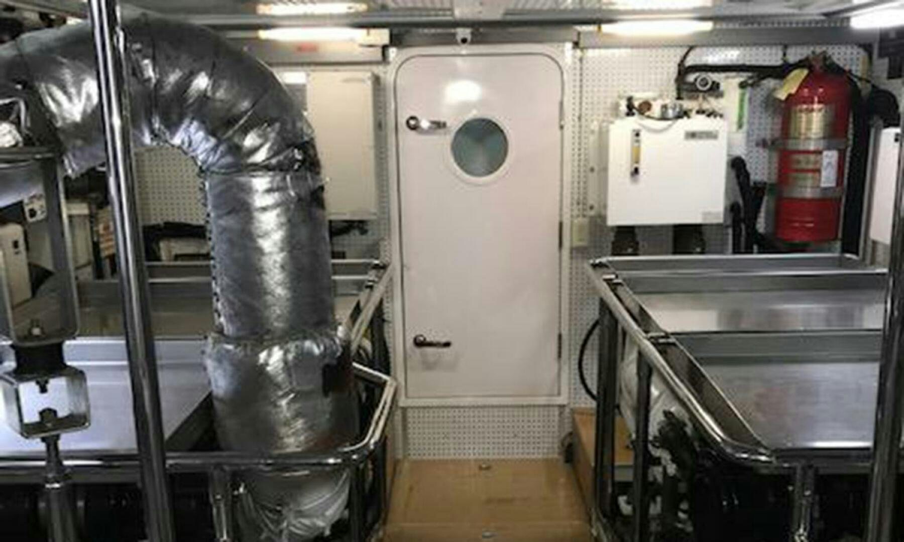 a machine in a room aboard BRAVO! Yacht for Sale