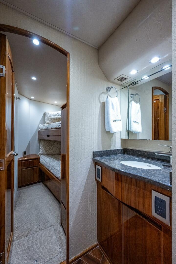 a bathroom with a sink and a mirror aboard GYPSEA Yacht for Sale