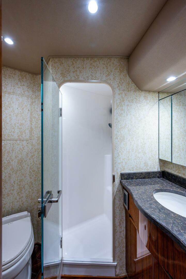 a bathroom with a toilet and sink aboard GYPSEA Yacht for Sale