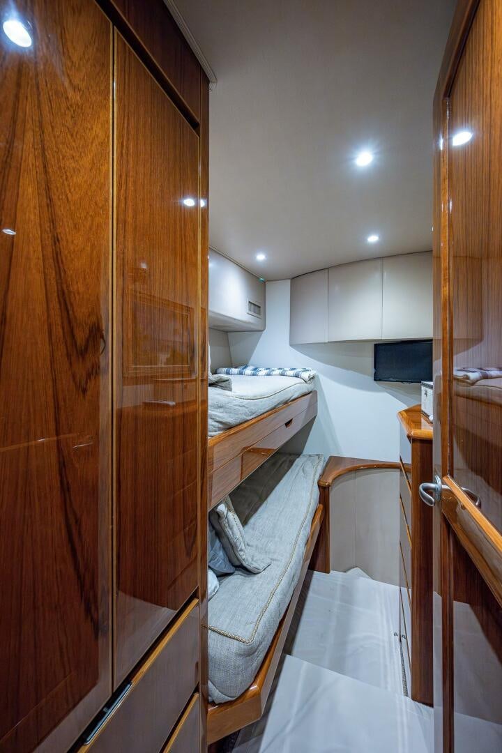 a bathroom with a wood cabinet aboard GYPSEA Yacht for Sale