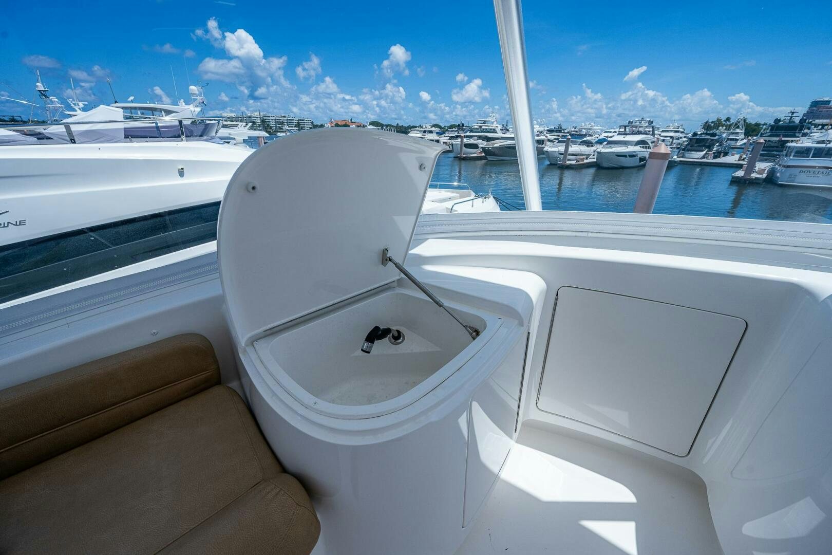 a boat with a white roof and a white tile roof with a white tile roof and a blue aboard GYPSEA Yacht for Sale