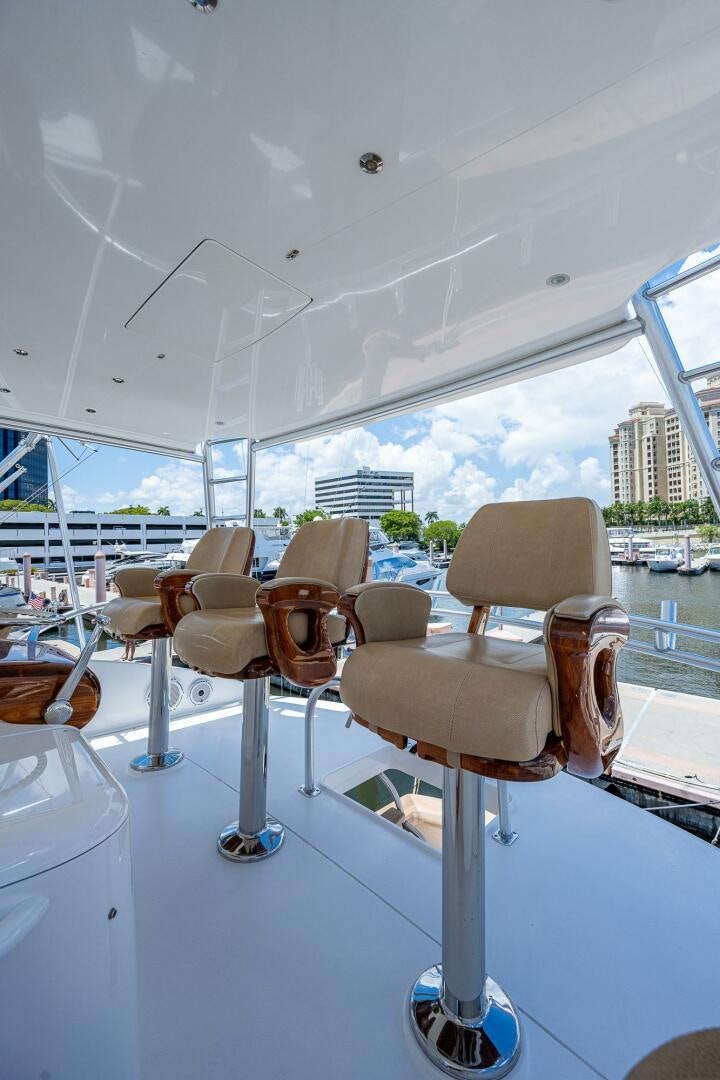 a room with chairs and tables aboard GYPSEA Yacht for Sale
