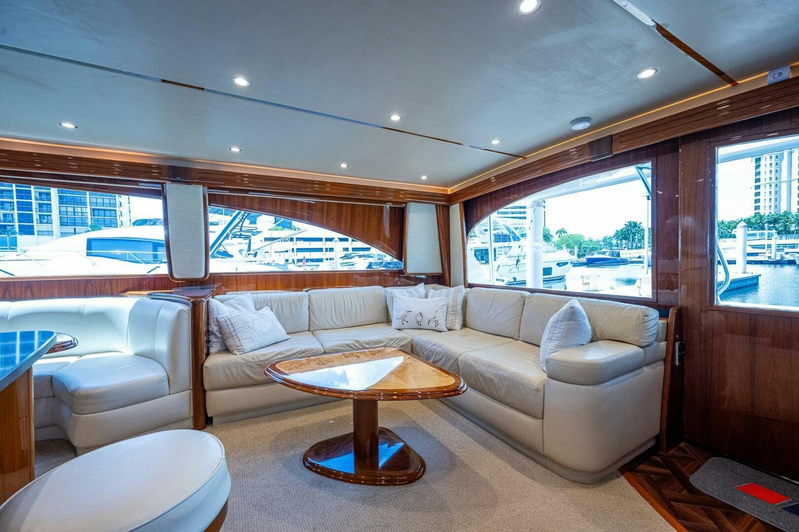 a living room with a large window aboard GYPSEA Yacht for Sale