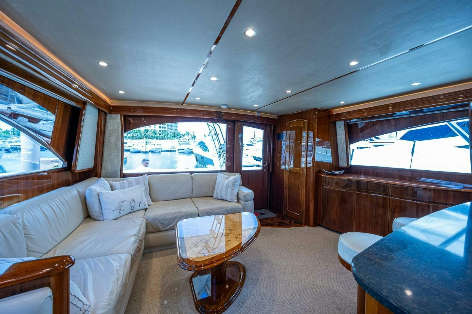 a living room with a large window aboard GYPSEA Yacht for Sale