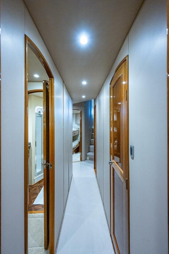 a hallway with doors aboard GYPSEA Yacht for Sale