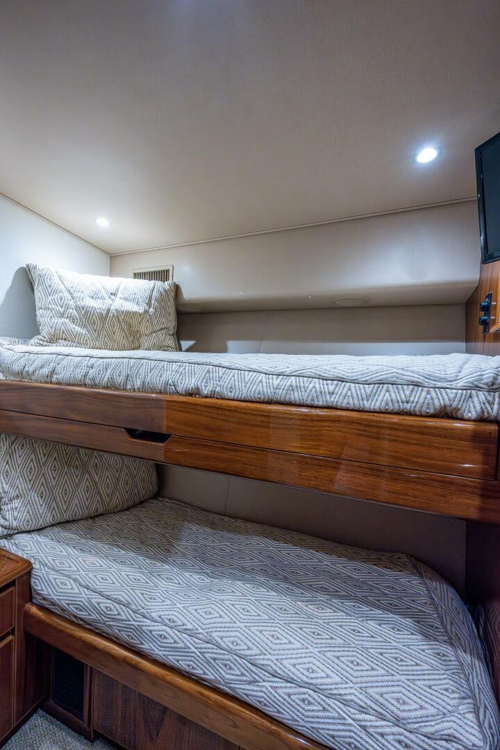a couple of beds in a room aboard GYPSEA Yacht for Sale