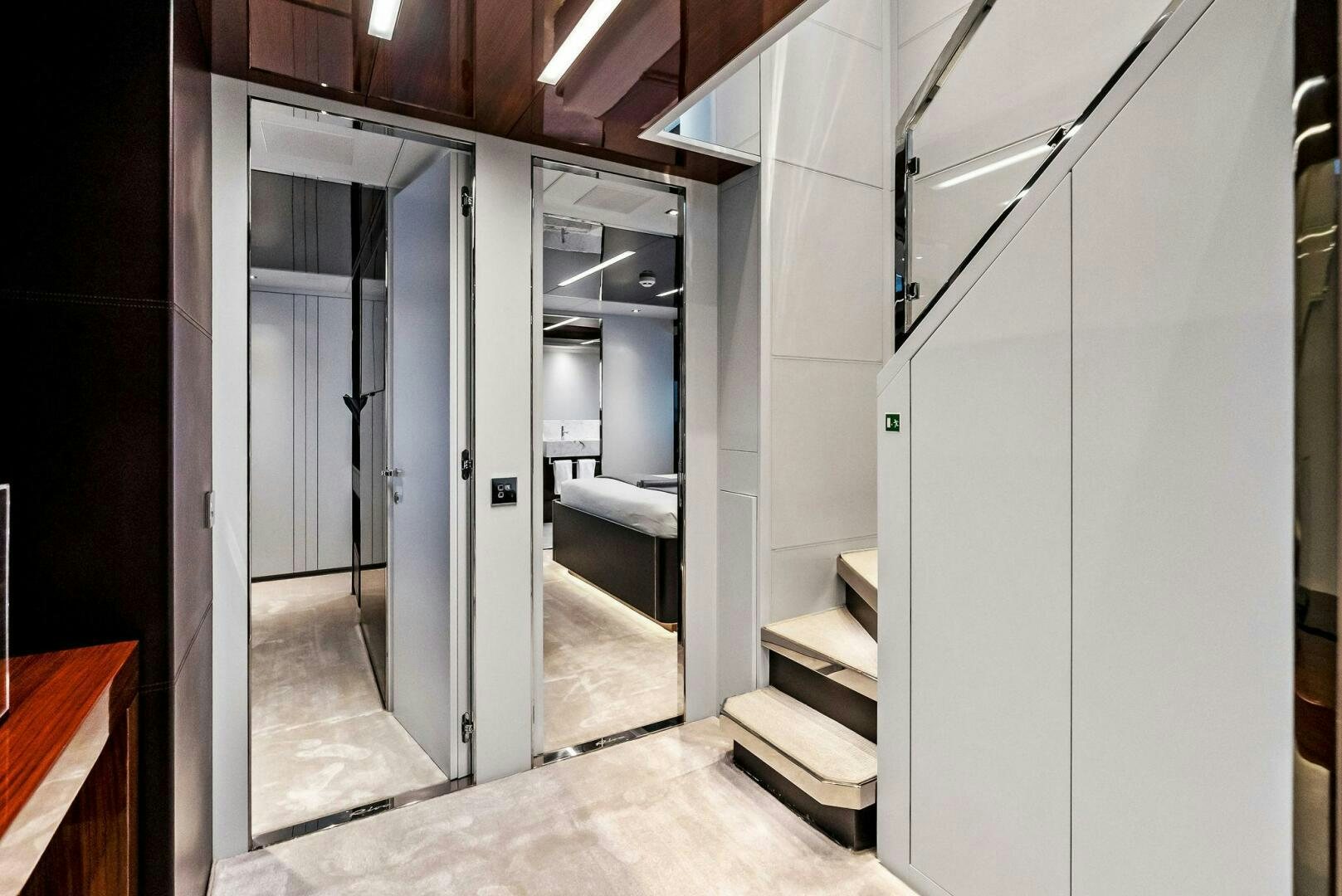 a hallway with doors aboard NO SURRENDER Yacht for Sale