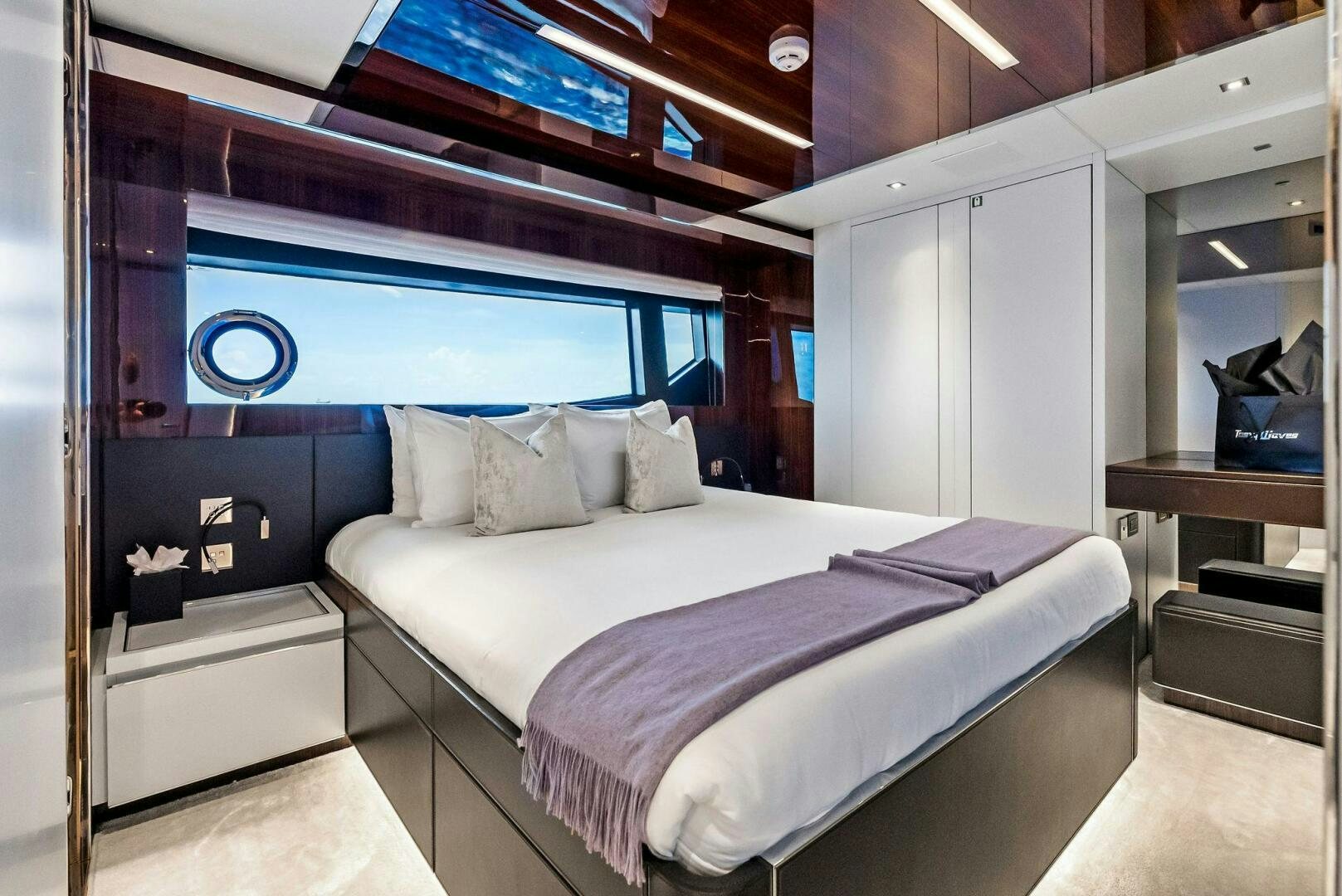 a bed in a room aboard NO SURRENDER Yacht for Sale