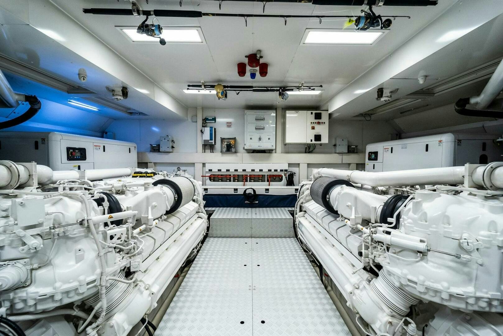 a room with several white machines aboard NO SURRENDER Yacht for Sale