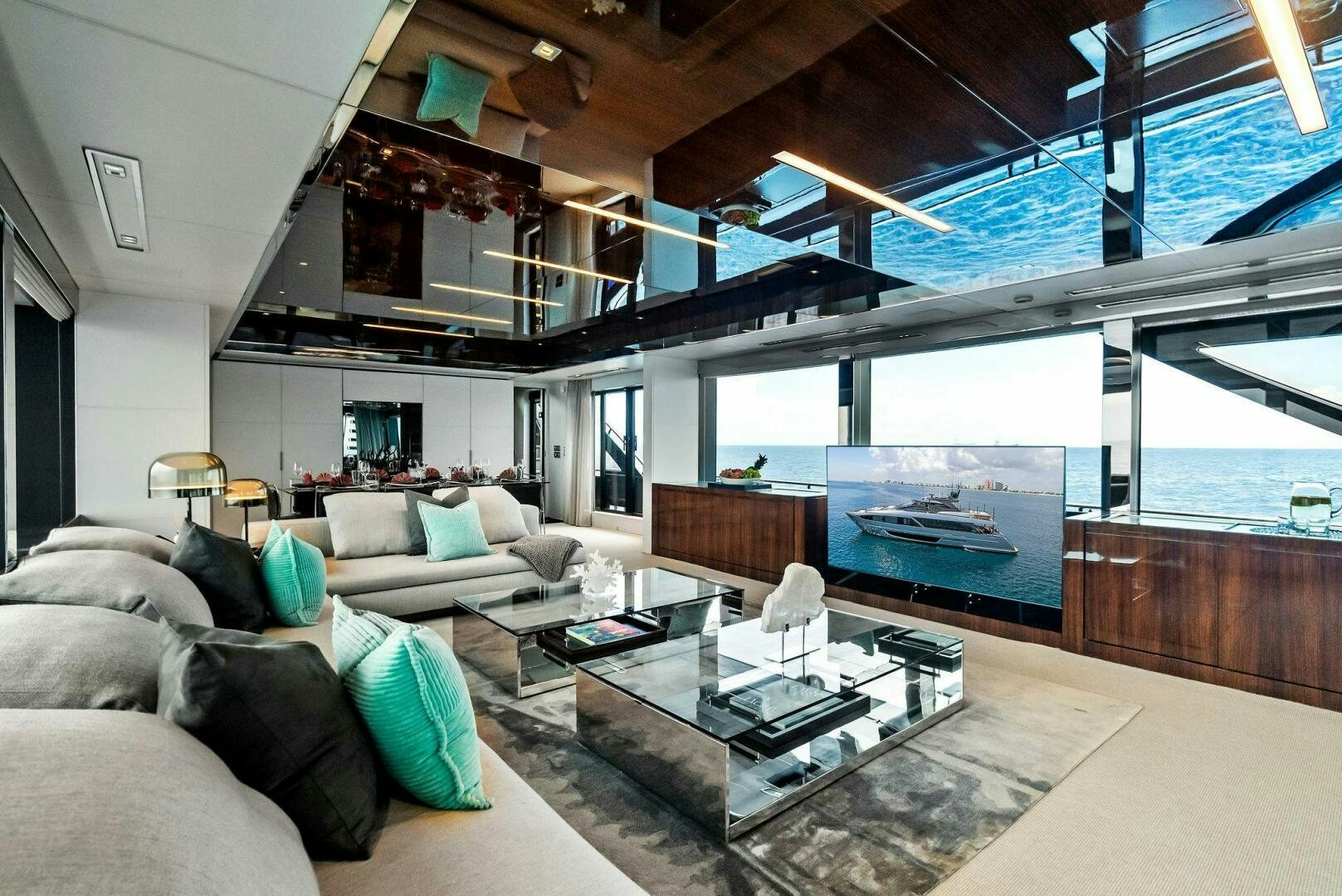 a living room with a large window aboard NO SURRENDER Yacht for Sale