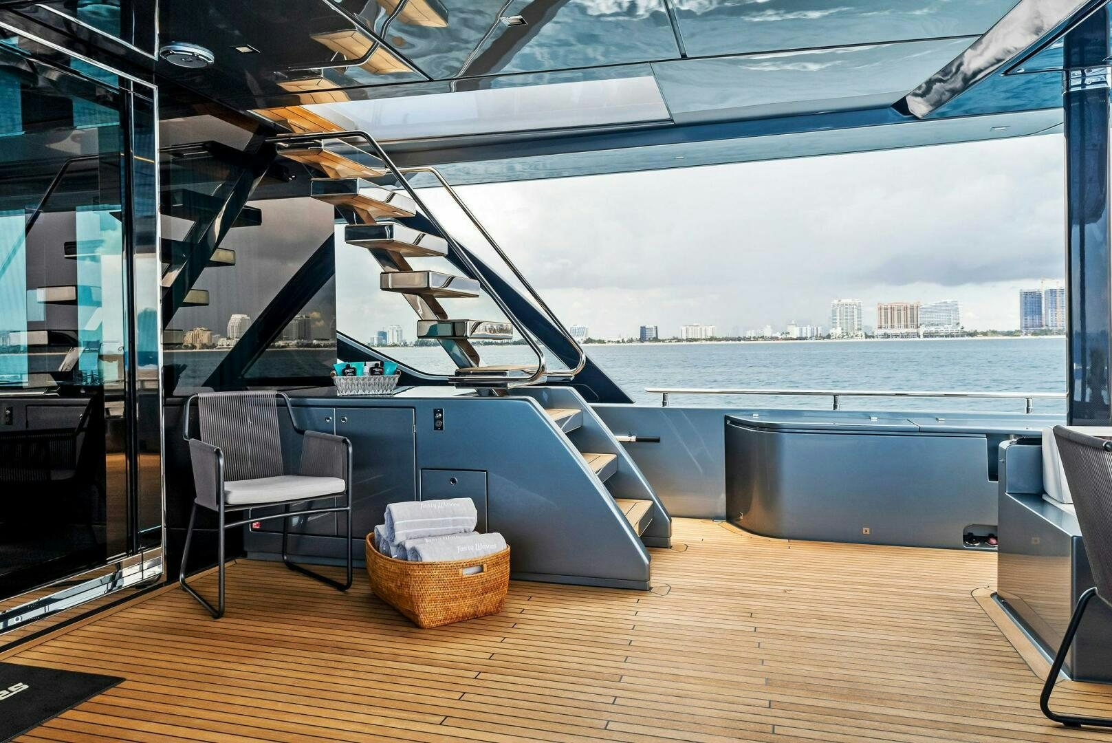 a room with a large window and a view of the city aboard NO SURRENDER Yacht for Sale