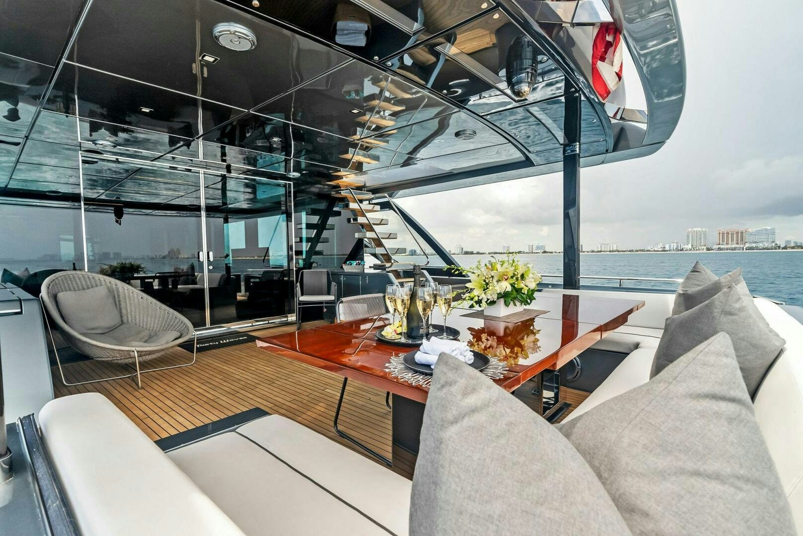 a room with a table and chairs aboard NO SURRENDER Yacht for Sale