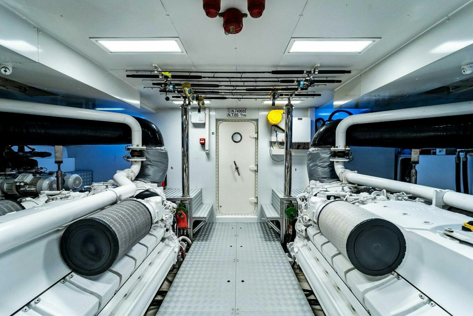 a room with large machines aboard NO SURRENDER Yacht for Sale
