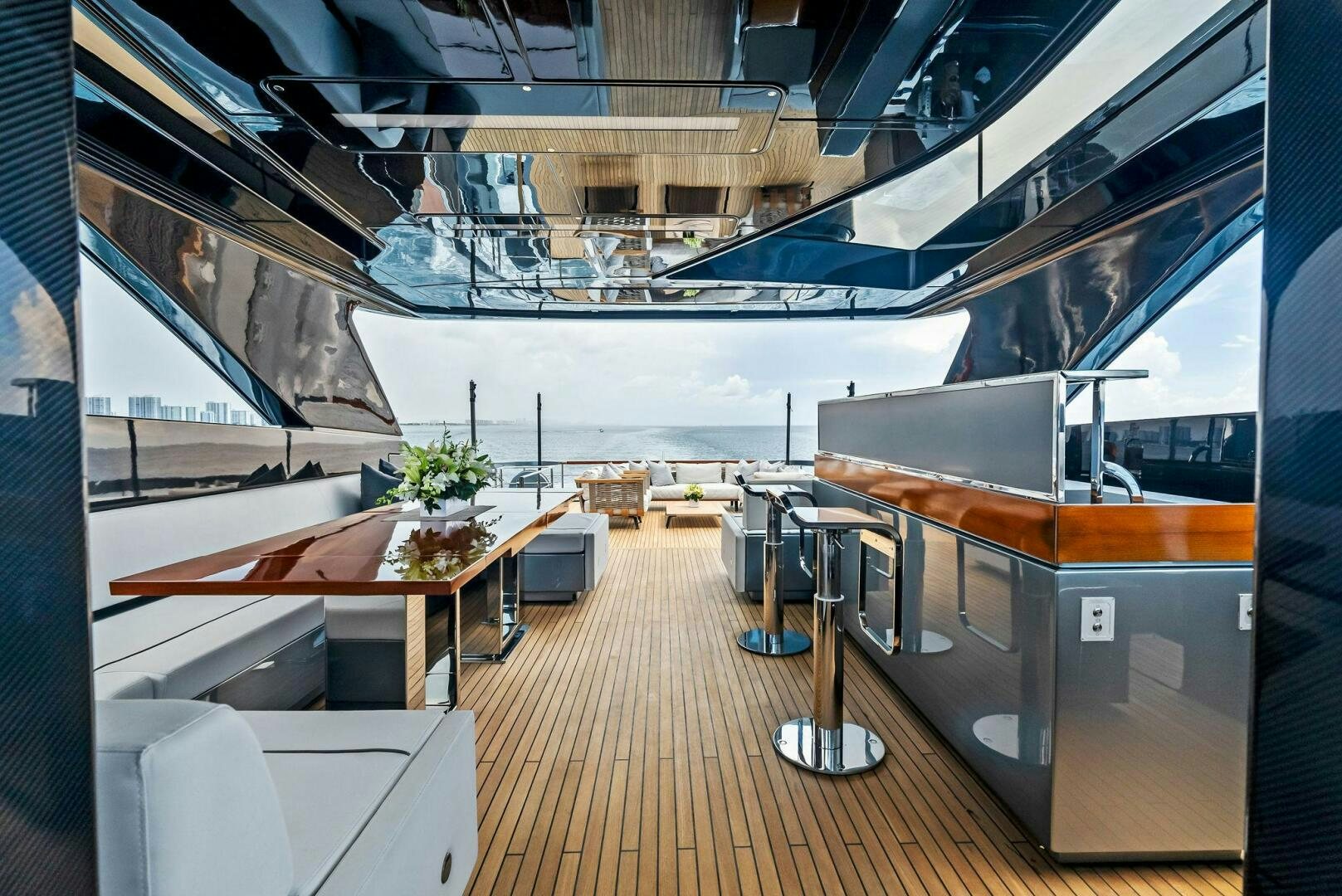 a room with a table and chairs aboard NO SURRENDER Yacht for Sale