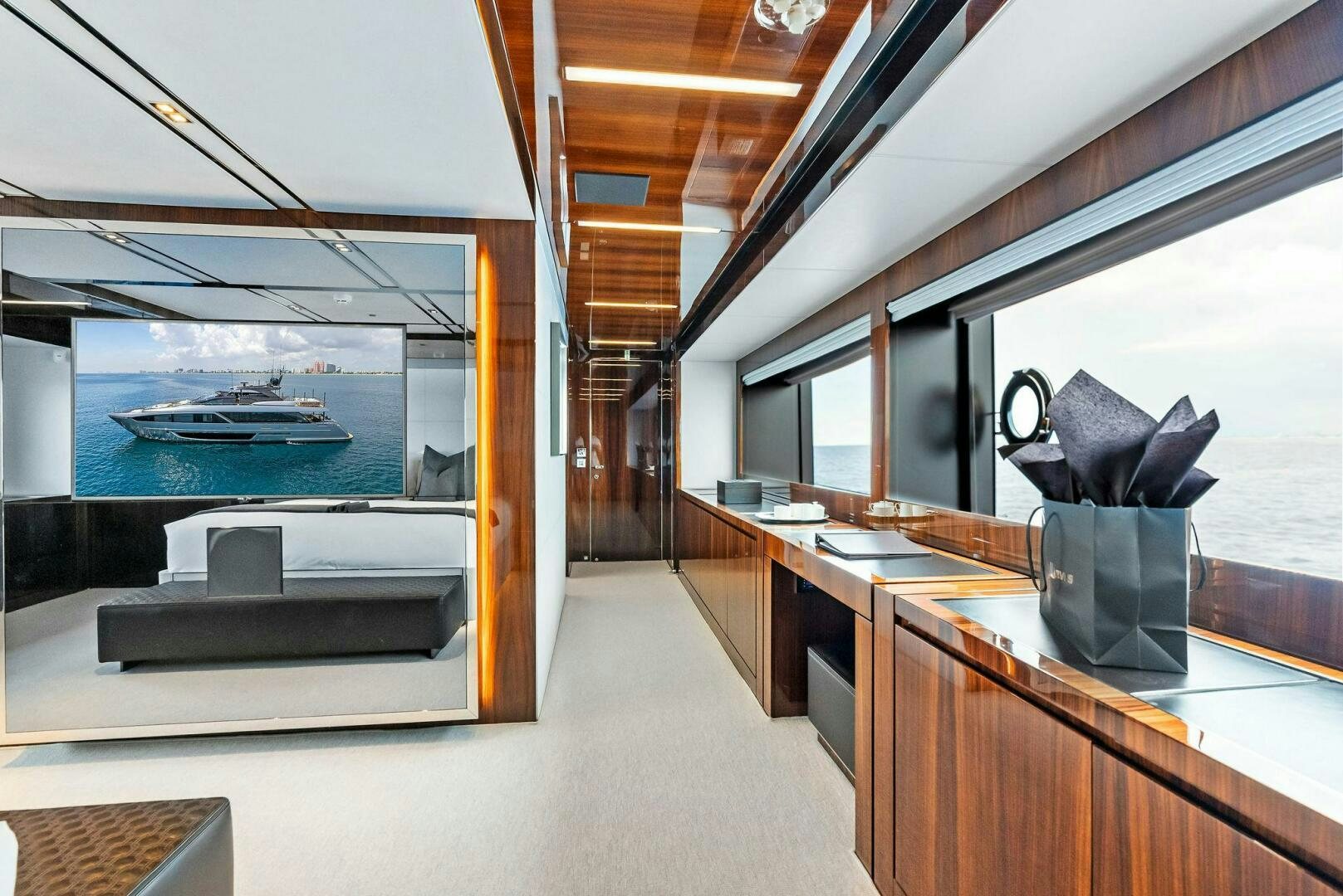 a modern looking kitchen with a large glass window aboard NO SURRENDER Yacht for Sale