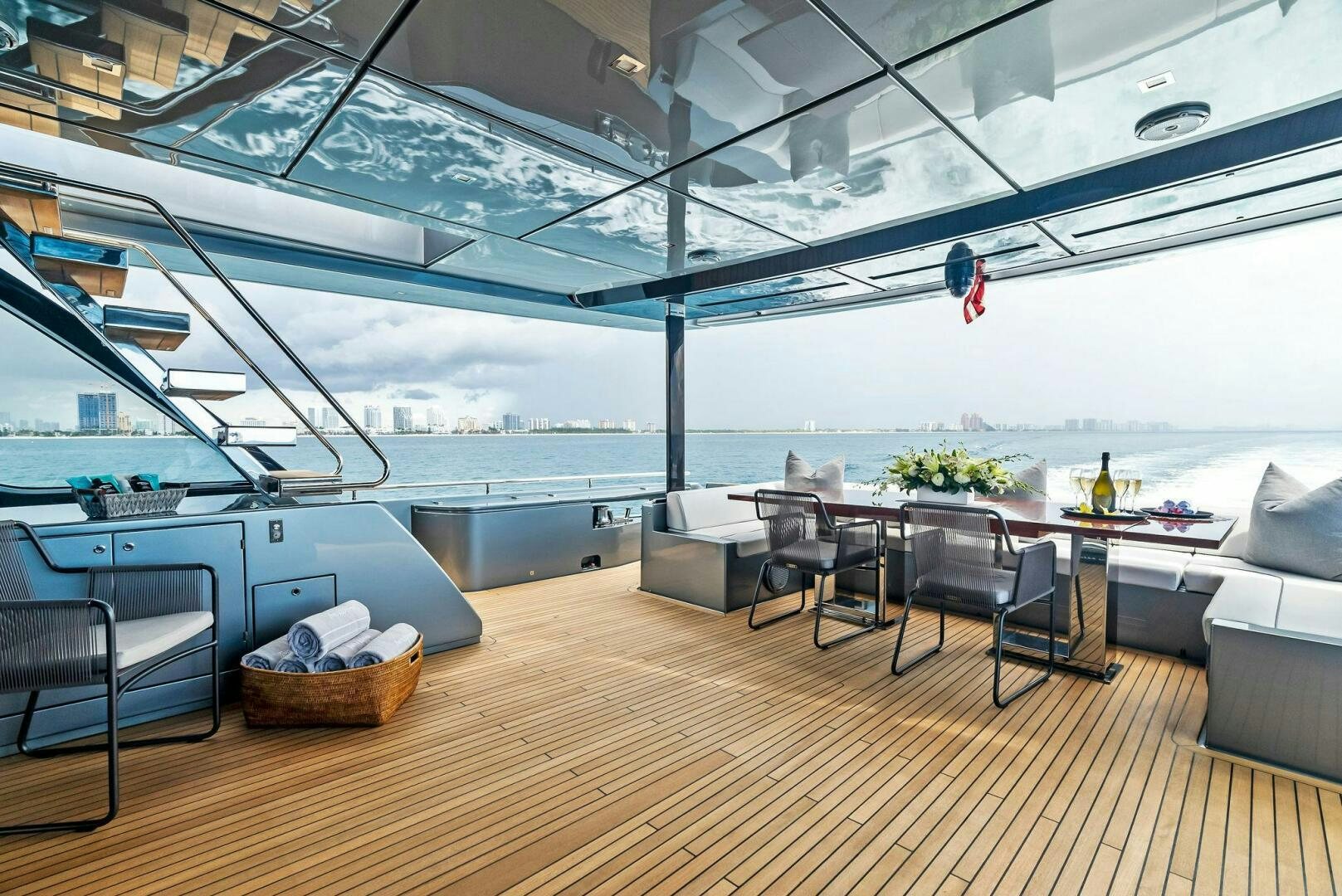 a room with a table and chairs aboard NO SURRENDER Yacht for Sale