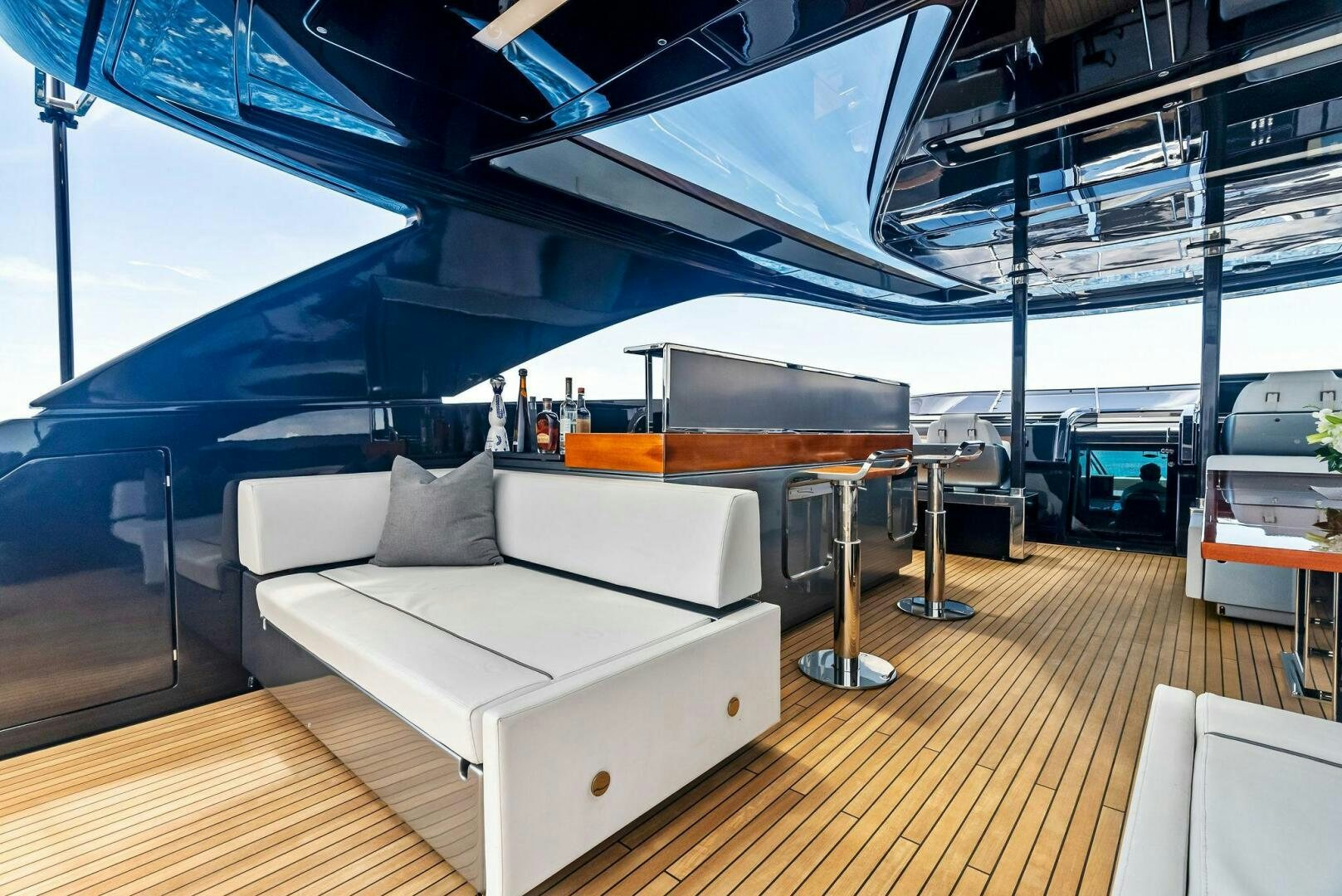 a room with a couch and a table aboard NO SURRENDER Yacht for Sale