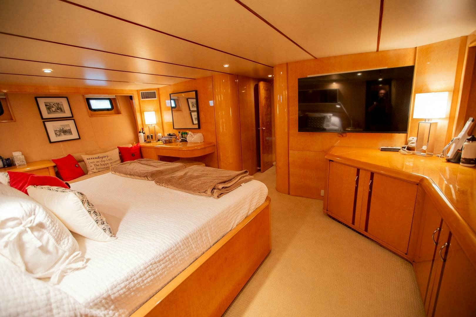 a room with a bed and a desk aboard PAINKILLER Yacht for Sale