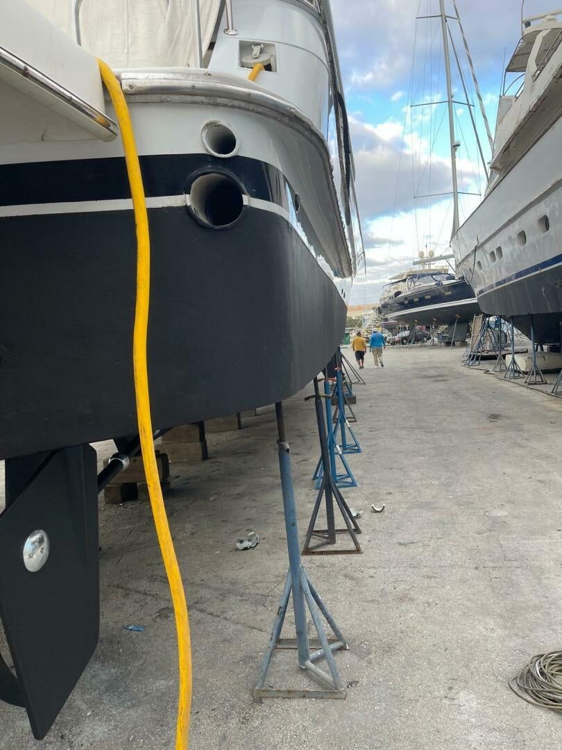 a boat with a large speaker attached aboard PAINKILLER Yacht for Sale