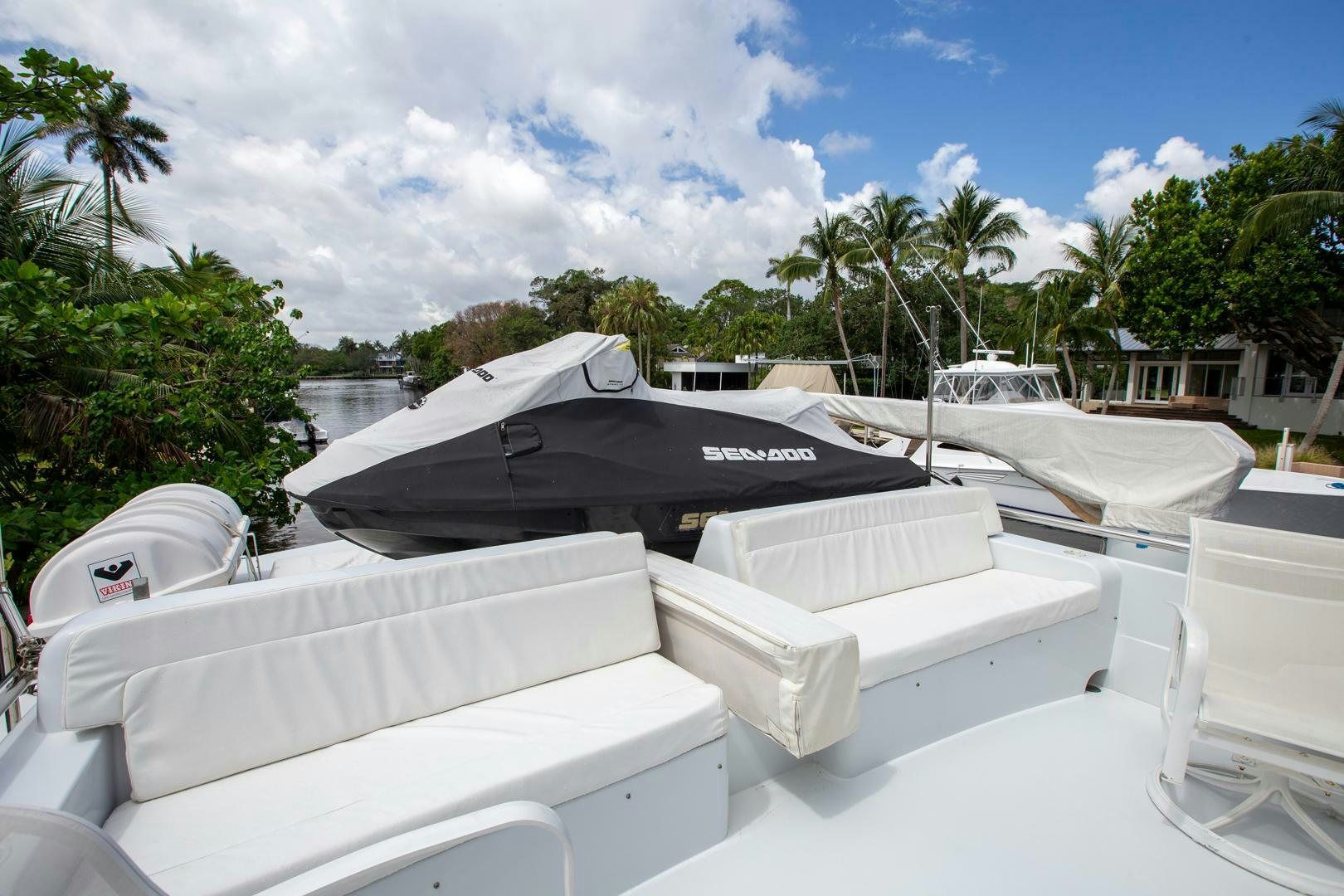 a group of white boats in a harbor aboard PAINKILLER Yacht for Sale