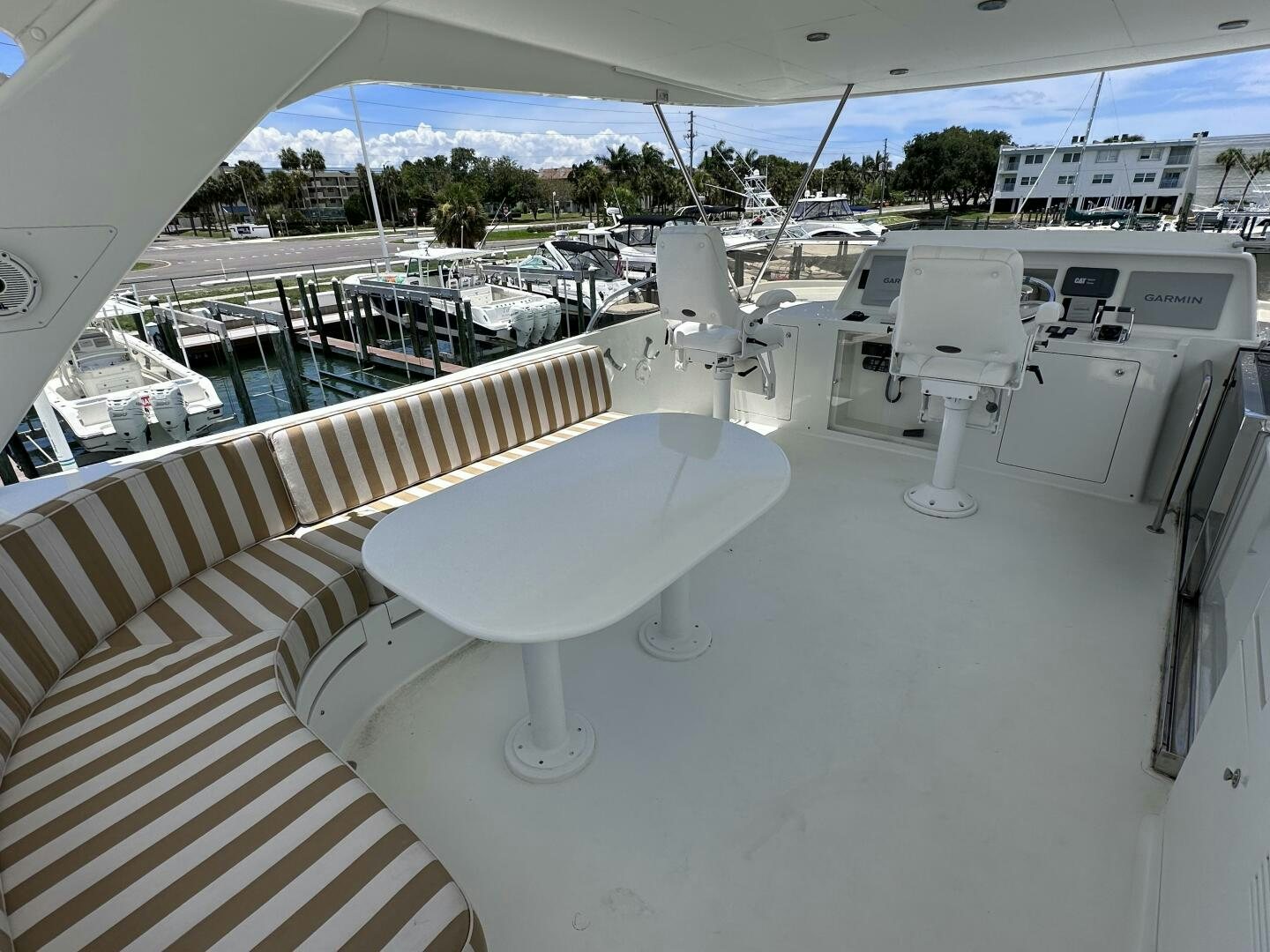 a white table on a boat aboard RECYCLING MADE CENTS Yacht for Sale