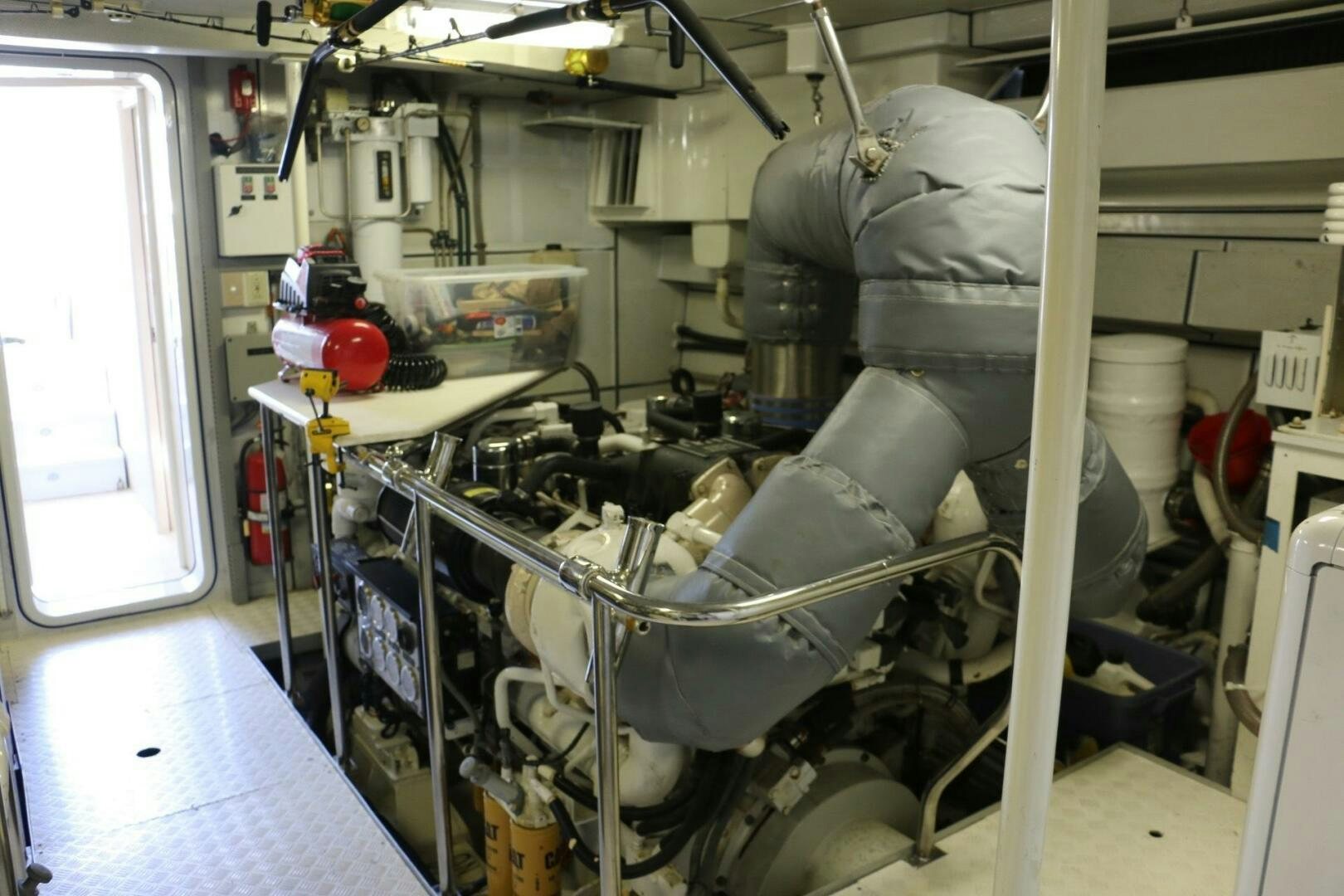 a large machine in a room aboard RECYCLING MADE CENTS Yacht for Sale