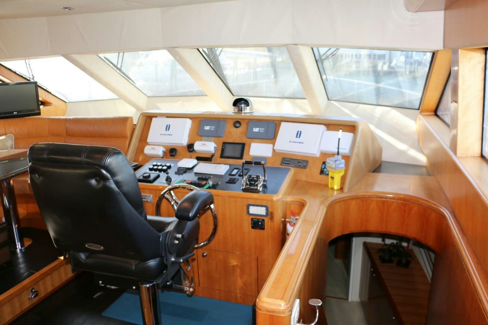a room with a desk and chairs aboard RECYCLING MADE CENTS Yacht for Sale