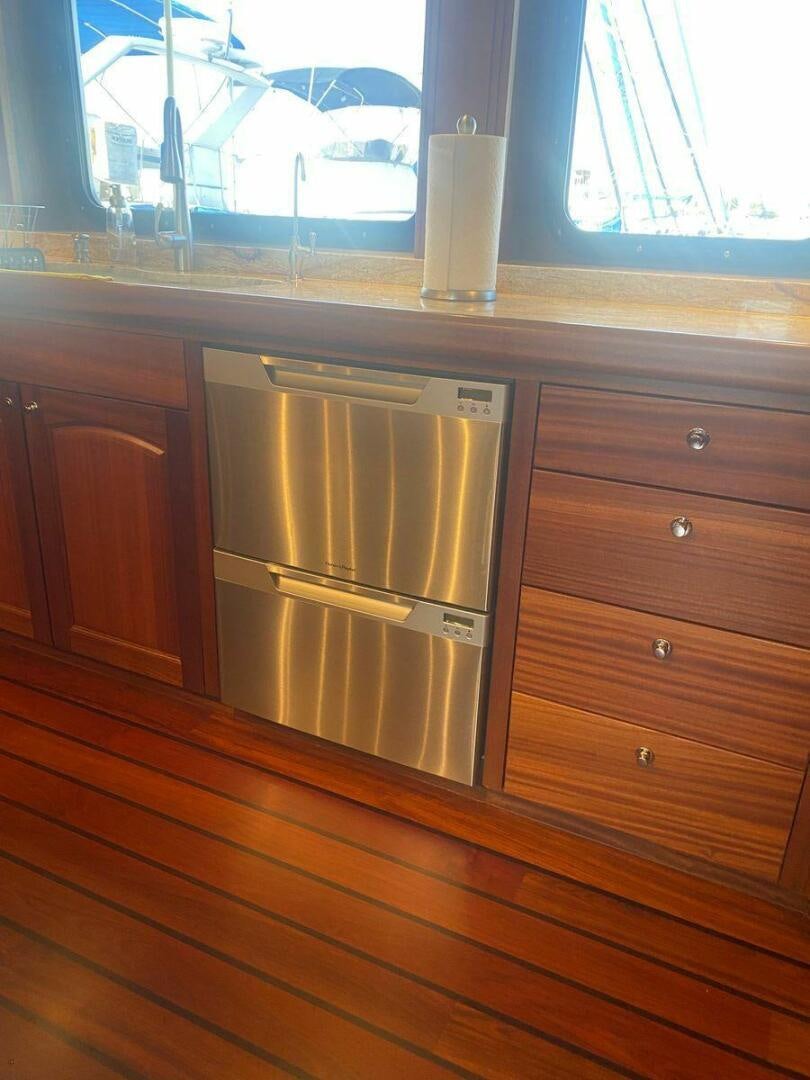a kitchen with a window aboard ALLSEAS Yacht for Sale