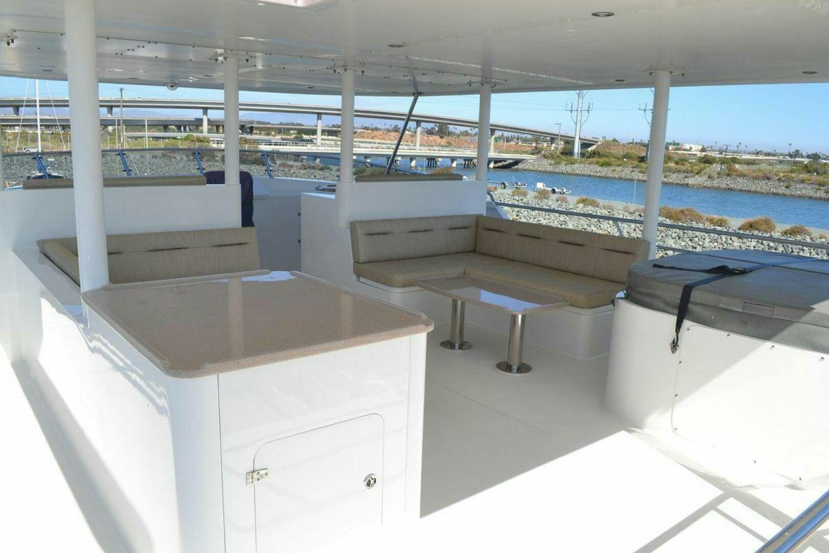 a room with tables and chairs aboard ALLSEAS Yacht for Sale