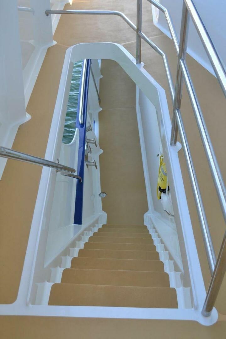 a set of stairs leading up to a building aboard ALLSEAS Yacht for Sale