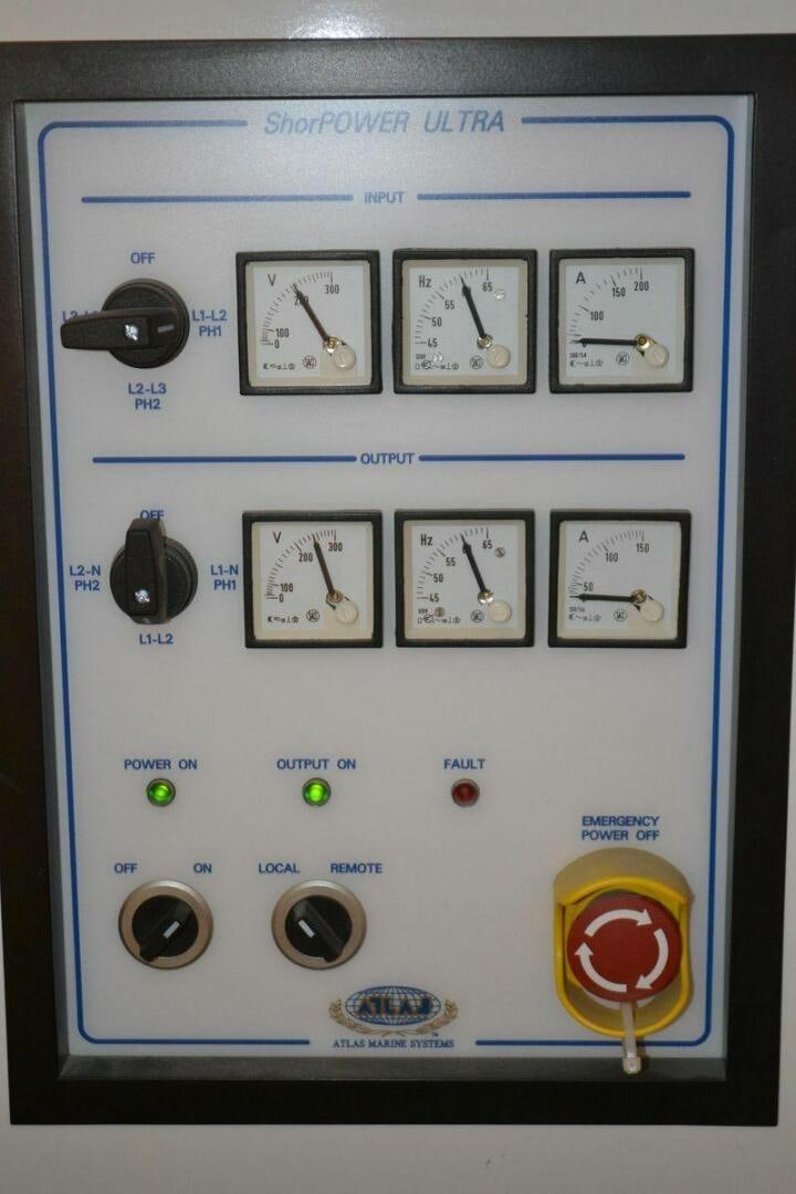 a white rectangular electronic device with a clock and buttons aboard ALLSEAS Yacht for Sale