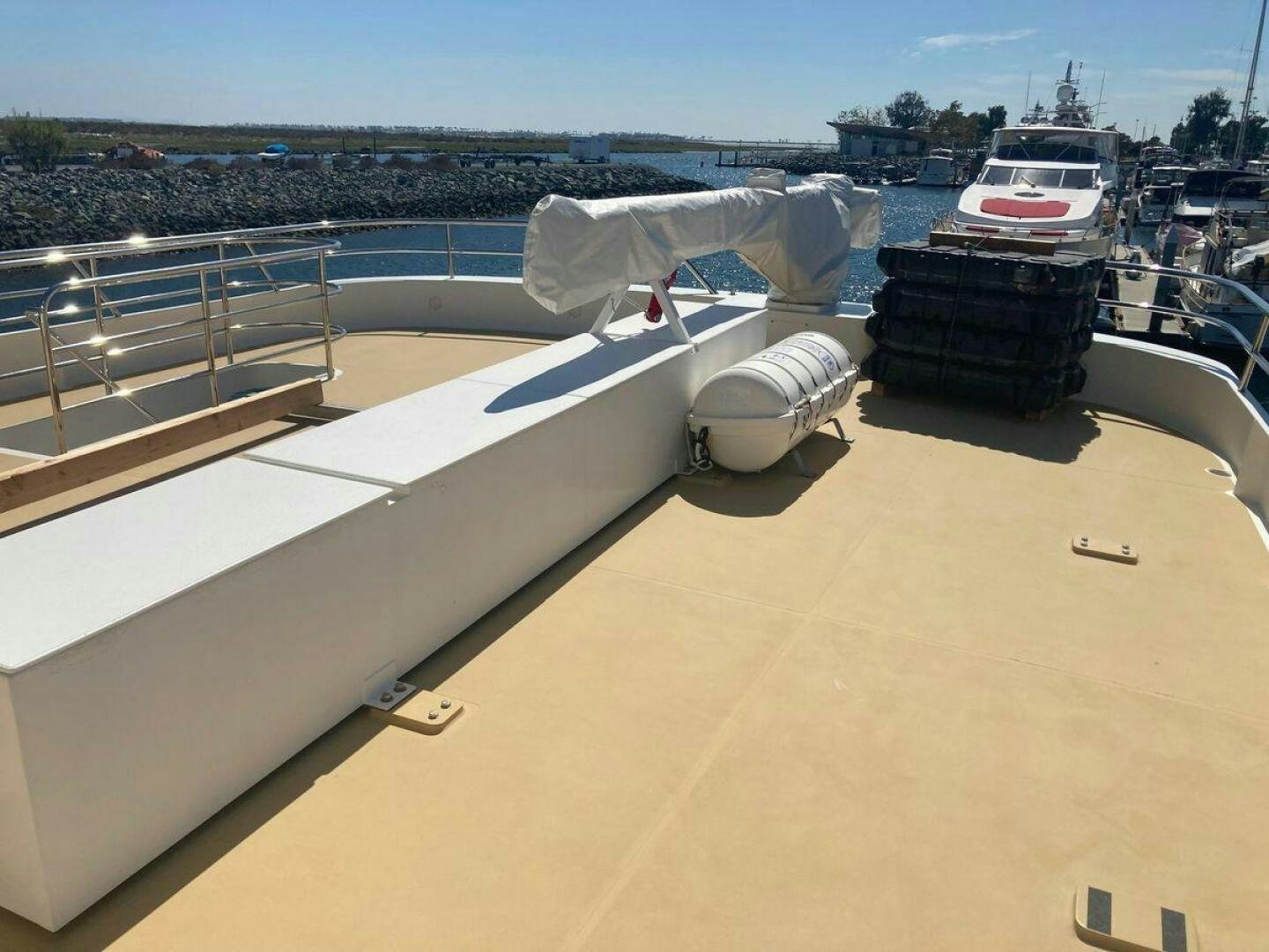 a large white boat on a dock aboard ALLSEAS Yacht for Sale