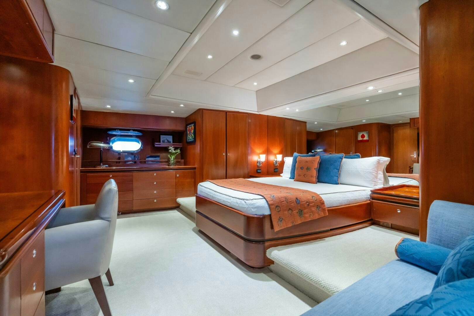 a bedroom with a bed and a tv aboard SEAQUELL Yacht for Sale