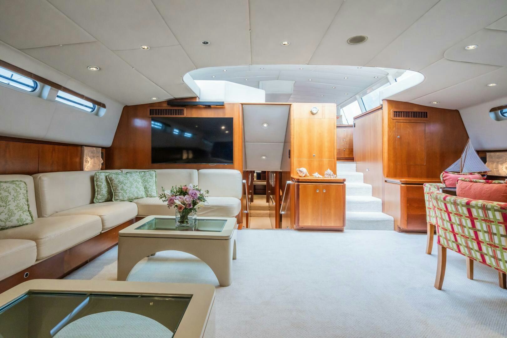a room with couches and a table aboard SEAQUELL Yacht for Sale