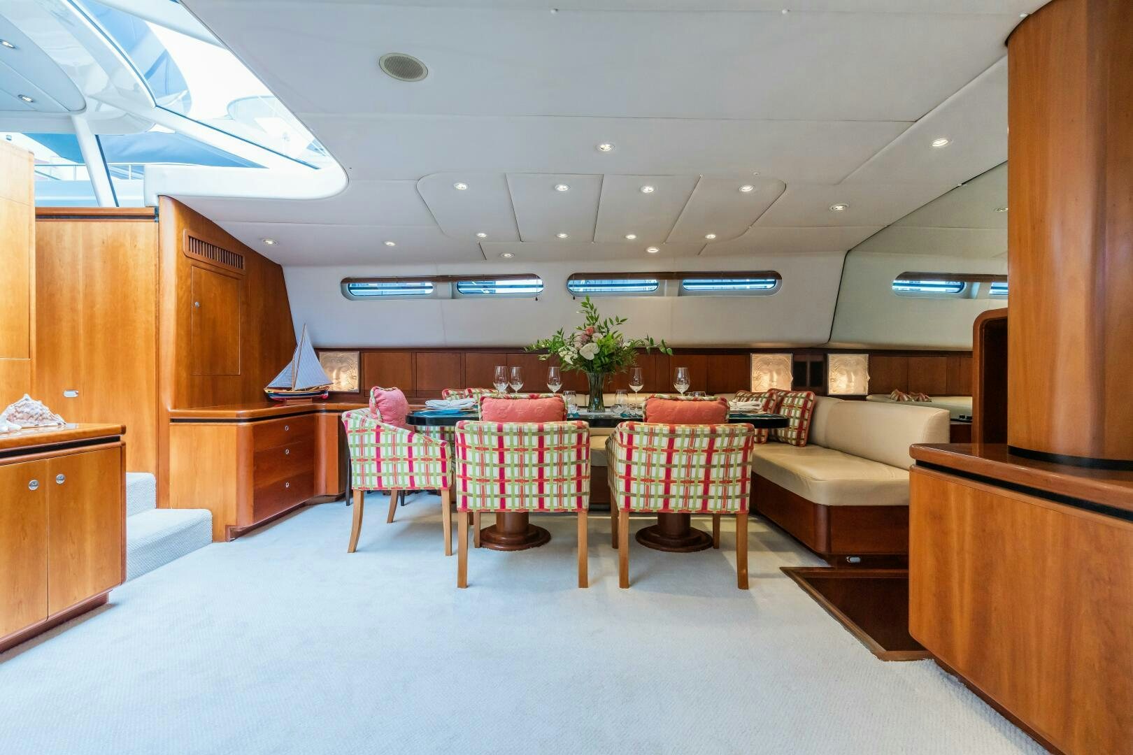 a room with a table and chairs aboard SEAQUELL Yacht for Sale