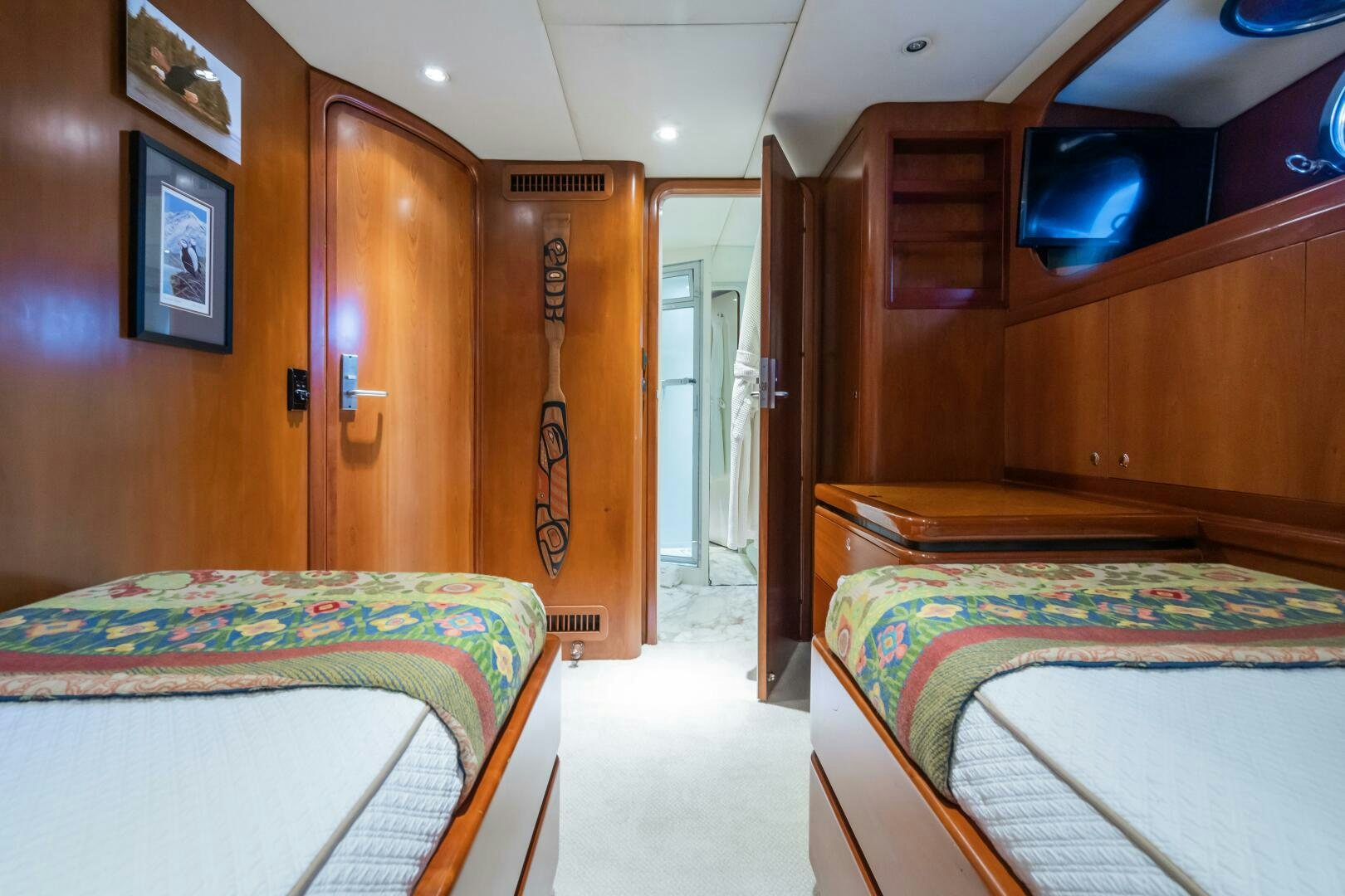 a room with wooden furniture aboard SEAQUELL Yacht for Sale