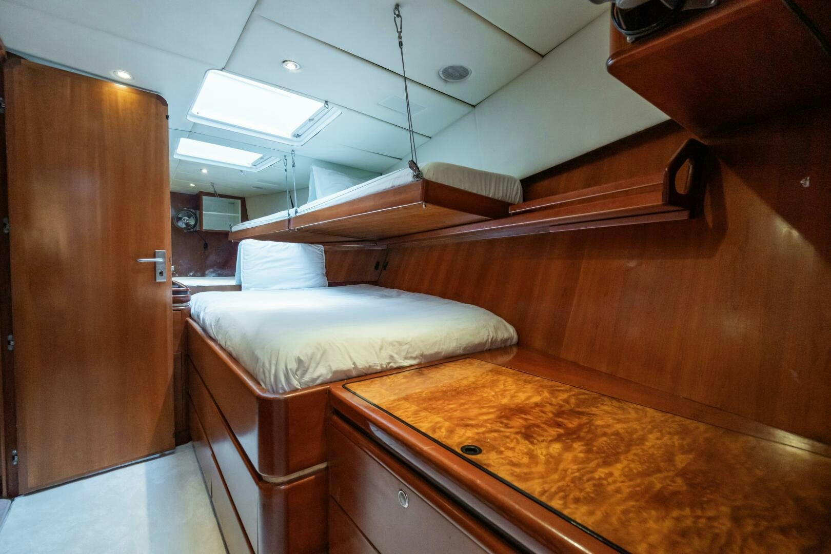 a bed in a room aboard SEAQUELL Yacht for Sale