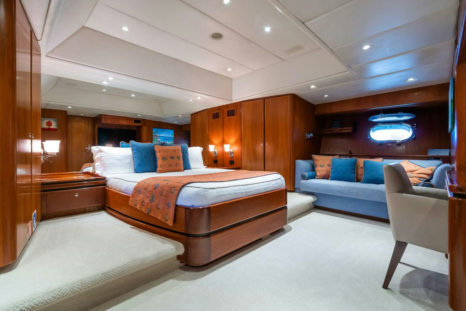 a bed and a couch in a room aboard SEAQUELL Yacht for Sale